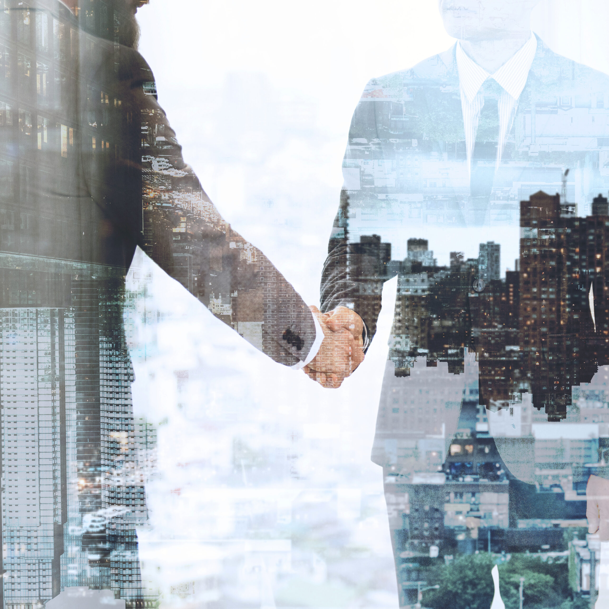 Business partners shaking hands